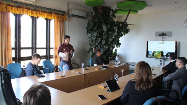 7 people meeting in a conference room discussing the hydrogen potential of Bhutan